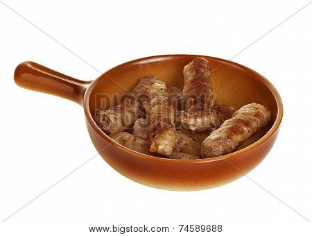 Sausages Wrapped In Bacon In A Frying Pan, Chevapchichi On White Background