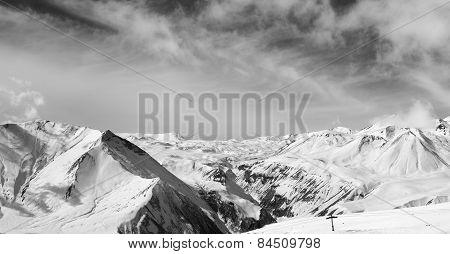 Black And White Panorama Of Winter Snowy Mountains