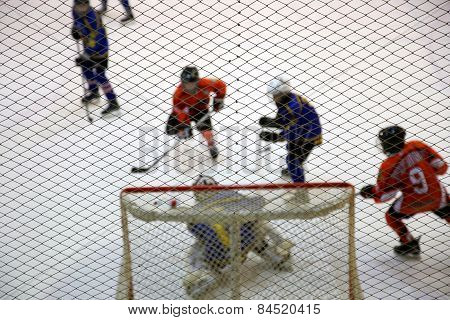 Atack Of Gate And Ice Hockey Goalkeeper