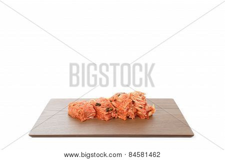 Red Gimchi On A Wooden Plate
