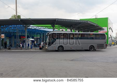 Large Bus At A Bus Station
