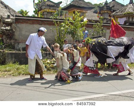 Children At A Religious Dance At The Street
