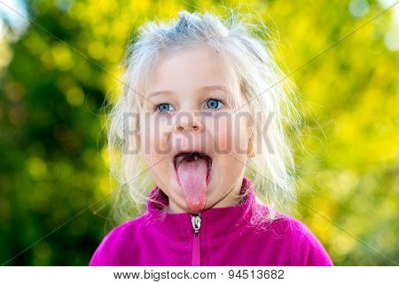 Happy Girl In Front Of Nature Background