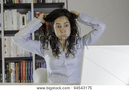 Girl Pulling Her Hair In The Office.
