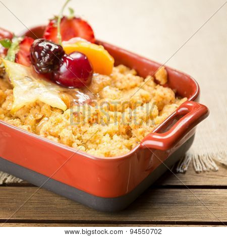 Apple Crumble On A Wooden Background