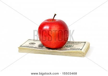 apple and dollars isolated on a white background