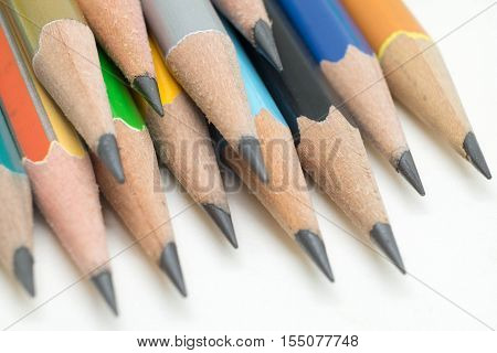 Tip of pencil with white background. In closeup.