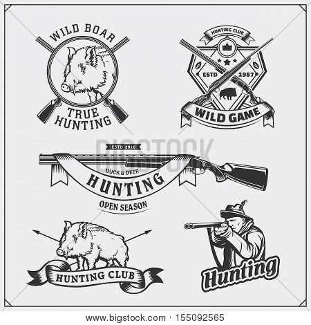 Set of vintage hunting wild boar labels, badges, emblems and design elements.