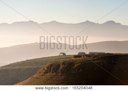 Plateau of Lessinia Regional Natural Park of Lessinia Veneto Verona Italy. In the background the Italian Alps (Monte Baldo - Baldo Mountain)