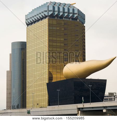 Tokyo Japan - September 28 2016: The two Asahi corporate buildings with two adjacent towers. Tallest one represents the image of a golden lager in a glass. Other is museum with flame on top. Highway in front.