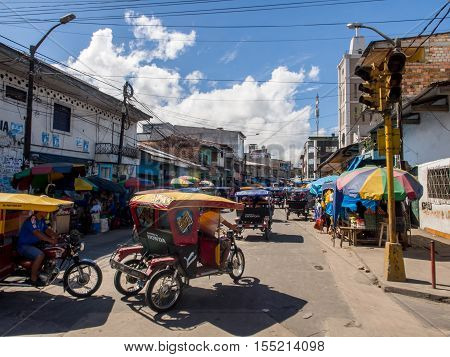 Rickshaws On A  Street