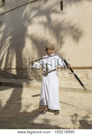 Young Omani Boy With A Sword