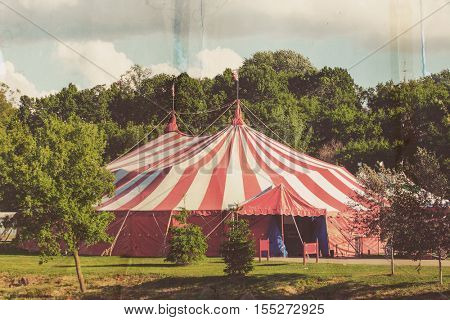 Vintage circus tent, old paper postcard effect 