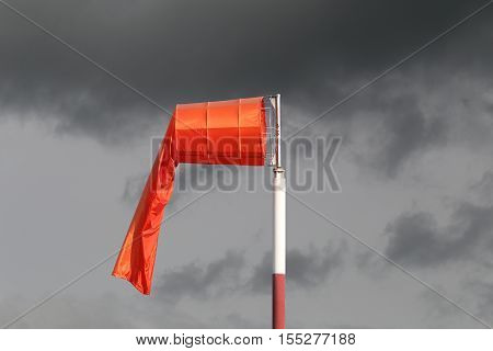 Wind sock of equipment check the wind blow direction in day time and no wind blow on overcast sky cloudy.