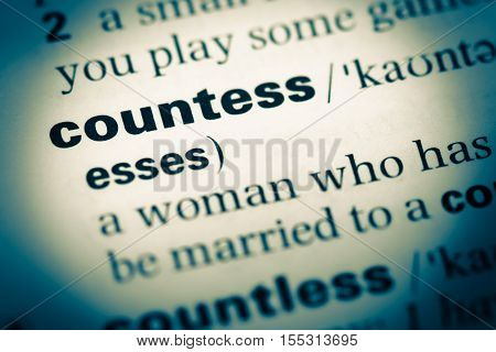 Close Up Of Old English Dictionary Page With Word Countess