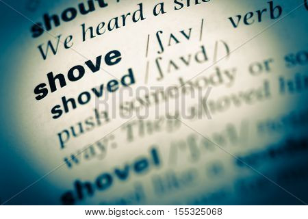 Close Up Of Old English Dictionary Page With Word Shove