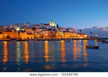 The village Ferragudo in the Algarve Portugal at sunset