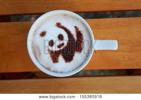 Panda in coffee white-cup, panda in coffee cupon wood