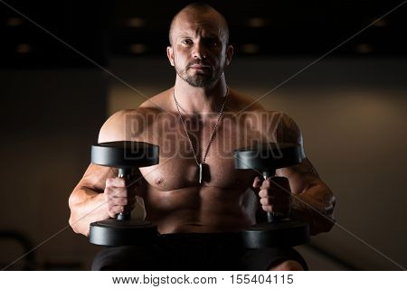 Muscular Man Resting On The Bench