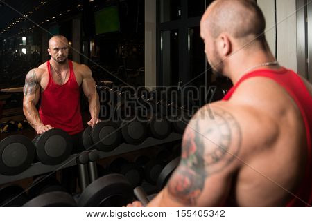 Bodybuilder Resting In Healthy Club
