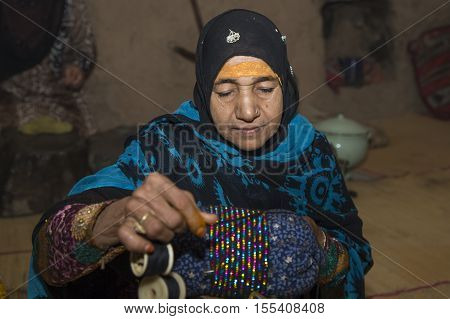 Omani Woman Making Traditional Bracelets