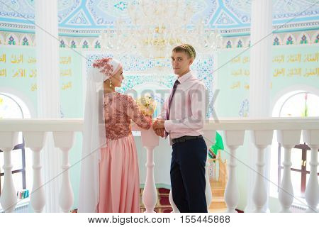 Islamic Couple In The Mosque On A Wedding Ceremony