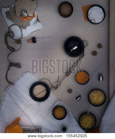 Alchemy Lab. dried herbs, salt, flasks, pipettes recipes on the old canvas