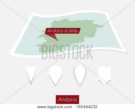 Curved Paper Map Of Andorra With Capital Andorra La Vella On Gray Background. Four Different Map Pin