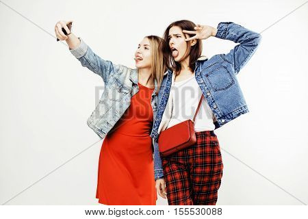 best friends teenage girls together having fun, posing emotional on white background, besties happy smiling, lifestyle people concept close up