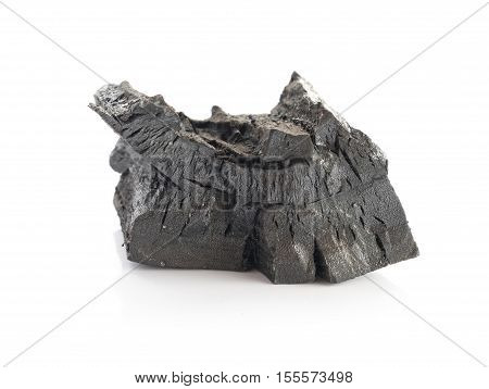 black charcoal on white background Used for cooking