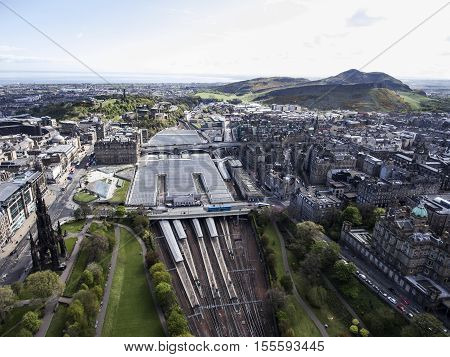 Edinburgh city historic Waverley Train Station Rail way on sunny Day Aerial shot 2
