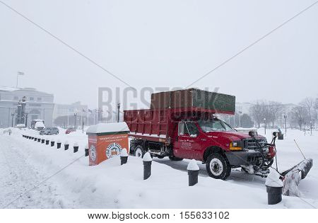 Washington D.C. USA - January 23 2016: Snow machine cleans the street during a snowstorm
