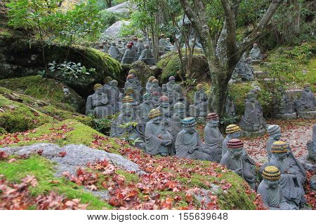 Buddhist statues among the rocks. Daishō-in, Itsukushima, Japan