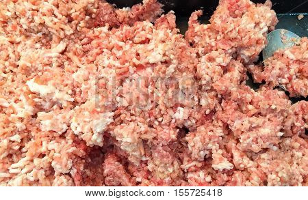 minced pork in the chicken background .