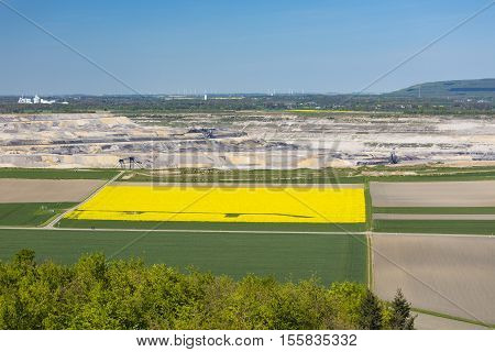 Pit Mine And Rape Field View
