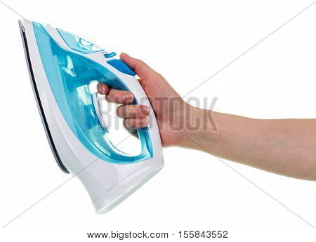 Steam iron in a female hand isolated on white background.