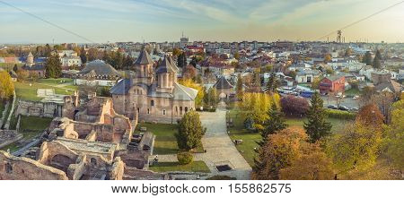 Panorama of the ruins of old castle in Targoviste, Romania. Old Royal Court ruins and the Royal Church of Targoviste, former Wallachian capital during the reign of Vlad Dracula, who also lived there.