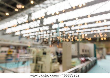 Abstract Blurred Background Interior Of Car Production Factory By Machine And Robot Automaton.