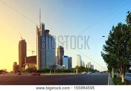 Dusk of the city high-rise buildings and streets.