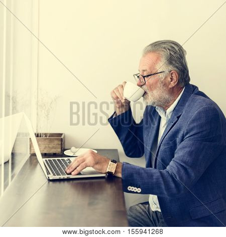 Senior Man Working Coffee Shop Relaxtion Concept