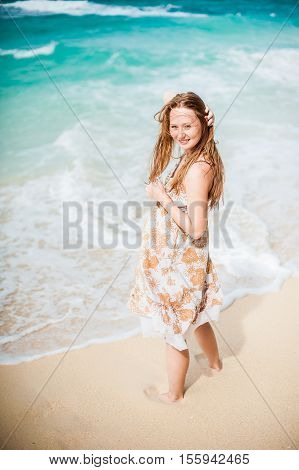 The Girl Walks On The Water's Edge On The Boracay