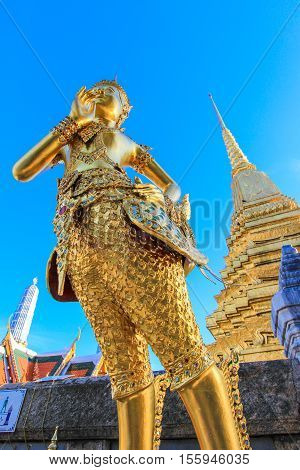 Golden statue in side public royal temple, Bangkok, Thailand