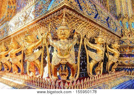 Golden statue inside public royal temple, Bangkok, Thailand