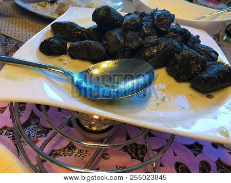 Dolma Tolma, Sarma - Stuffed Grape Leaves With Rice And Meat. Traditional Caucasian, Ottoman, Turkis