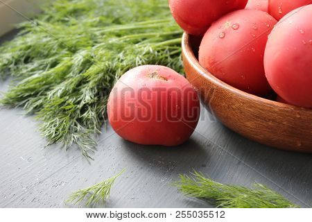 Fresh Red Ripe Tomatoes And Fresh Dill Greens For Salad Making, Close-upn