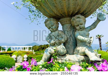 South Gyeongsang, South Korea - April 28, 2018 : Flower Pot Decorated With Childern Plaing Music Scu