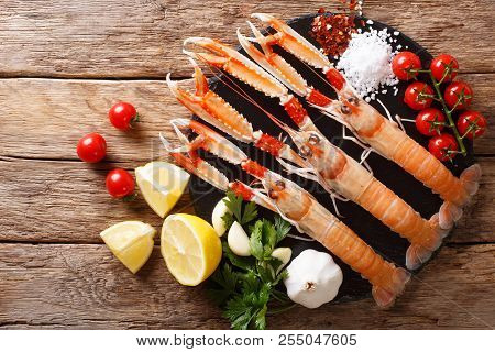 Food Background Fresh Raw Langoustine, Scampi With Vegetables, Herbs And Spices Close-up. Horizontal