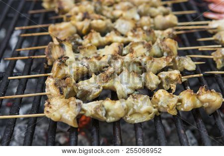 Rapan Meat On The Grill. Delicious Festive Barbecue. Food And Holiday Concept. Cooking Bbq Seafood O