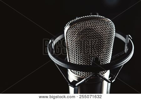 Professional Studio Condenser Microphone On Black Background