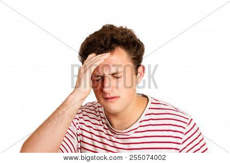 Desperate Crying Man With Hand In Hair. Emotional Man Isolated On White Background.